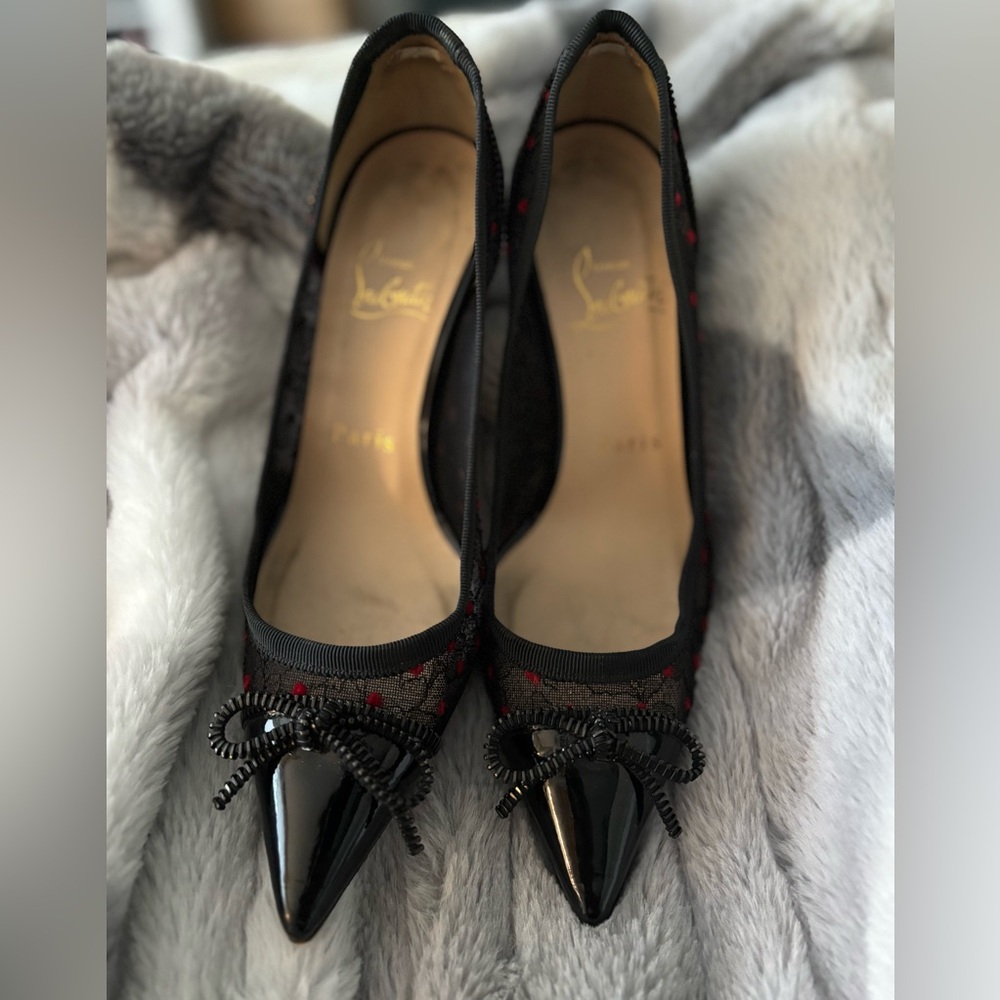 Authentic Christian Louboutin black mesh heels/pumps.